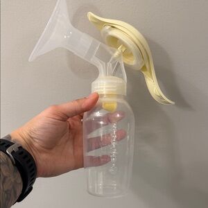 Medela Manual Breast Pump with Yellow Accents
